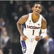  ?? Jessica Hill / AP ?? UConn’s Christian Vital reacts after scoring in against Columbia in November.