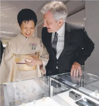  ?? Picture: AFP ?? Christian Dior Couture boss Sidney Toledano guides Japan’s Princess Takamado during a preview of Dior's new shop at the Ginza shopping district in Tokyo.