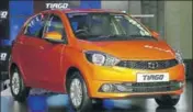  ?? HT/FILE ?? Newer models like the Tiago hatchback with its contempora­ry styling have helped Tata Motors boost sales