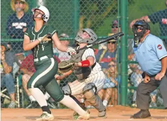  ?? STAFF PHOTO BY ROBIN RUDD ?? Silverdale Baptist’s Braylee Raby watches her home run sail toward the fence during a 1-0 win for the Lady Seahawks against Columbia Academy in the TSSAA Division II-AA softball state tournament Wednesday in Murfreesbo­ro, Tenn.
