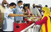  ?? G.N. JHA ?? Delhi CM Arvind Kejriwal during opening of free food programme at a night shelter in New Delhi on Sunday.
—