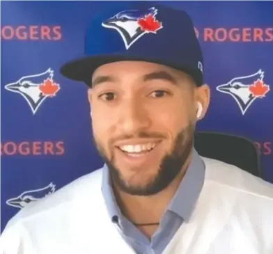  ?? THE CANADIAN PRESS / HANDOUT ?? George Springer smiles in this screen grab from a virtual news conference he took part in on Wednesday.