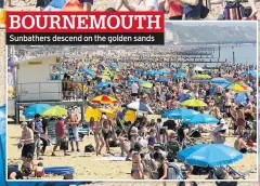  ??  ?? BOURNEMOUT­H Sunbathers descend on the golden sands