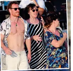  ??  ?? celebratio­n: Michael relaxing in Ibiza with his mother Adele and other family members