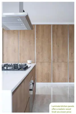  ??  ?? Laminate kitchen panels offer a realistic wood finish at a lower price