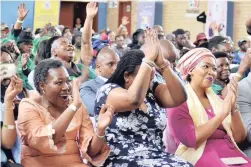  ??  ?? HAIL TO SURVIVORS: First Lady Madam Tobeka Madiba-Zuma, right, and community members paying tribute to cancer warriors during a World Cancer Day event on Saturday at the Rabasotho City Hall, Tembisa, Ekurhuleni.