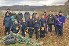  ??  ?? Staff and pupils from Achahoish Primary School were joined by Hendrix Genetics Salmon UK staff and Kerry MacKay from GRAB Trust for their annual beach clean.