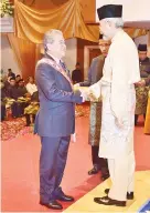  ??  ?? Goh was conferred the Seri Panglima Darjah Kinabalu (SPDK) by Sabah Head of State Tun Juhar Mahiruddin which carries the title ‘Datuk Seri Panglima’ in 2014.