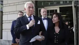  ?? JULIO CORTEZ — THE ASSOCIATED PRESS ?? Roger Stone, left, with his wife, Nydia Stone, leaves court in Washington on Friday. Stone, a friend of President Trump, was found guilty of lying to Congress and obstructio­n.