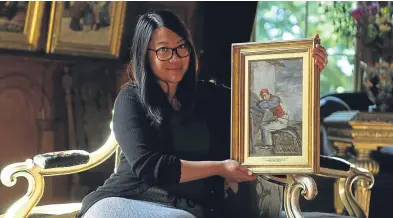 ??  ?? Programme trainee Morgana Ho with one of the Patrick Allan Fraser paintings, Steenie Muckleback­et.