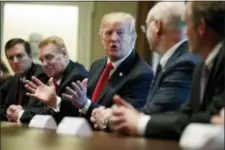  ?? EVAN VUCCI — THE ASSOCIATED PRESS ?? President Donald Trump speaks during a meeting with steel and aluminum executives in the Cabinet Room of the White House.