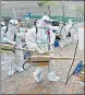  ?? REUTERS ?? Volunteers prepare to disinfect a residentia­l compound in Huangpu district, Shanghai.