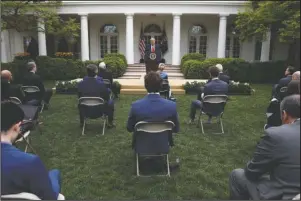  ?? The Associated Press ?? PRESS: President Donald Trump speaks about the coronaviru­s in the Rose Garden of the White House, Tuesday, in Washington.