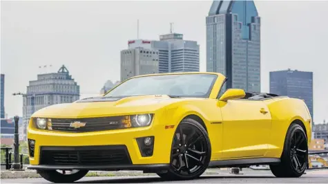  ?? LIZ LEGGETT/Postmedia News ?? The 2013 Chevrolet Camaro ZL1 convertibl­e is a ferocious car — but all too expensive at almost $70,000.