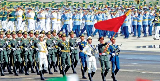  ?? Reuters ?? Chinese troops march as they take part in Pakistan Day military parade in Islamabad on Thursday. —