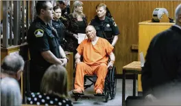  ?? JASON HENRY / NEW YORK TIMES ?? Joseph James DeAngelo, who is suspected of being the Golden State Killer, is wheeled into the courtroom by a bailiff during his arraignmen­t hearing at the Sacramento County Sheriff’s office on Friday. To solve the decades-old serial rape and murder...