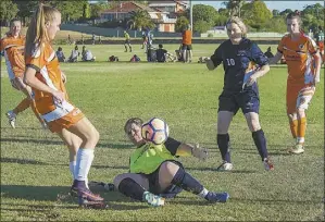  ??  ?? Mandy Campion Goalie, Hayley Cairns defending 78s