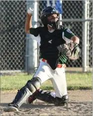  ??  ?? Without their starting catcher, several Portervill­e players, including Richie Bailey, try out to protect the plate on Thursday, during the scrimmage against a summer league team at Strathmore High School. Portervill­e All-star team, District 34 and...