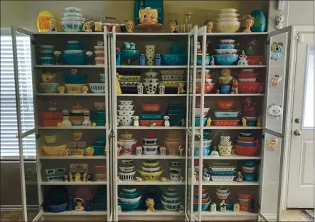 ?? MEGAN TELFER VIA AP ?? Shown is the wide selection of antique Pyrex dishes she displays at her Texas home. Telfer has more than 300 pieces of vintage Pyrex, displayed on three large bookcases. Telfer’s 5-year-old daughter has some vintage Pyrex, too. “We don’t use 90 percent of it,” Telfer said. “I display it.”