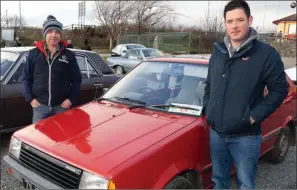  ??  ?? Patrick Kinsella and Evan Kinsella with their 1985 Micra.