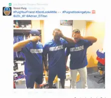  ?? Courtesy Los Angeles Dodgers ?? An image from the Dodgers’ Twitter page includes Yasiel Puig (center) and other Dodgers in T-shirts with the hashtag #DONTLOOKAT­ME, trolling the Giants’ Madison Bumgarner.