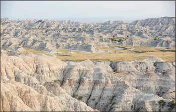  ?? RYAN HERMENS / RAPID CITY JOURNAL FILE VIA AP (2018) ?? The Badlands National Park is pictured Aug. 17, 2018, in Pennington County, S.D.