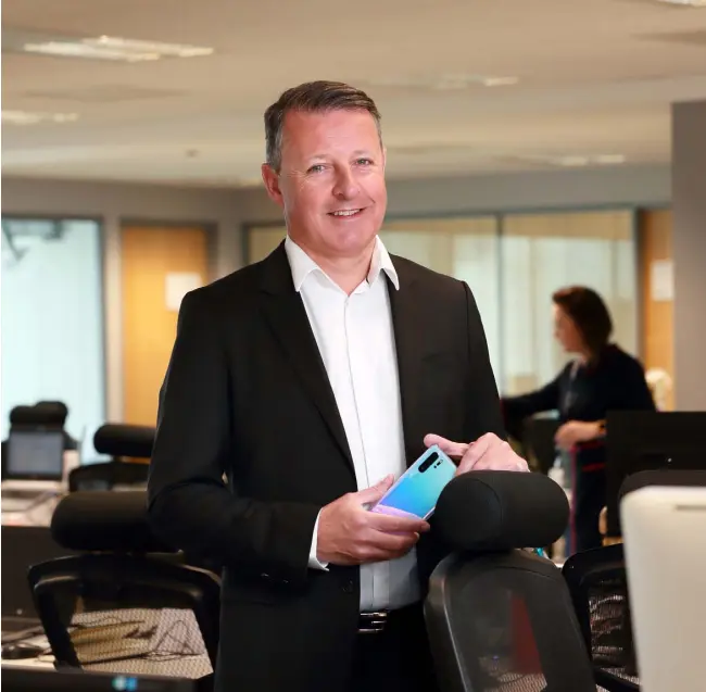  ??  ?? Dixons Carphone boss Mark Delaney at the group’s offices in Santry. Photo: Frank McGrath