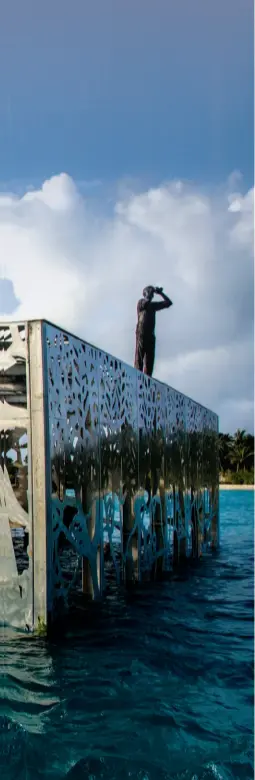  ??  ?? LEFT The high grade, polished, marine stainless steel of the building mirrors the surroundin­g blues of the coral atoll and the sky above