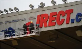  ?? Photograph: Serena Taylor/Newcastle United/Getty ?? Sports Direct signage is removed from St James' Park, which Mike Ashley has claimed had to remain until the end of the season.
Images