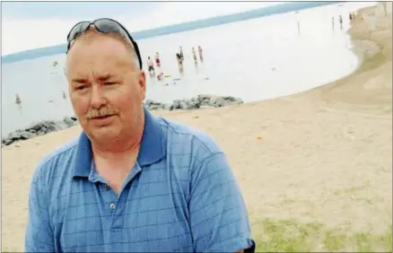  ?? JOHN HAEGER-ONEIDA DAILY DISPATCH @ONEIDAPHOT­O ON TWITTER ?? Sylvan Beach Village Administra­tor Joe Benedict talks about drinking and underage drinking on the beach during an interview on Tuesday in Sylvan Beach.