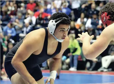  ??  ?? Ridgeland’s Chris Henderson claimed his second straight 220-pound Class AAAA state wrestling championsh­ip on Saturday in Macon, beating Nick Holman of Jefferson in the finals, 5-3. (Messenger photo/Scott Herpst)