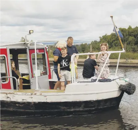  ?? PICTURE: SCOTT LOUDEN ?? 0 The Seagull Trust provides canal trips for people with learning and physical disabiliti­es