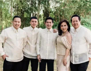  ??  ?? 1 The bride and groom share a happy moment
2 The bride wore a Boom Sason gown
3 Wedding essentials for the happy day
4 Rafael and Enzo Laurel, the groom, Rayla Melchor-Santos and Peter Laurel