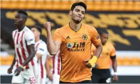  ?? Photograph: Peter Powell/EPA ?? Wolves’ Raul Jimenez celebrates after scoring from the penalty spot against Olympiakos at Molineux.