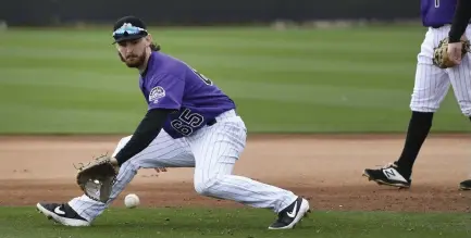  ?? Andy Cross, Denver Post file ?? Rockies infielder Brendan Rodgers is a natural shortstop but he could end up playing second if Ryan McMahon moves over to first base to replace Daniel Murphy who could be used as a designated hitter.