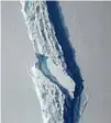  ??  ?? This file photo shows the Antarctic Peninsula’s rift in the Larsen C ice shelf from NASA’s IceBridge mission Digital Mapping System. (AFP)