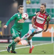  ??  ?? Struggle...Rapid’s Louis Schaub (left) in action against SV Ried