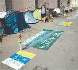  ?? AFPPIC ?? Tents of anti-tourism activists on hunger strike in La Laguna on the Spanish Canary island of Tenerife. –