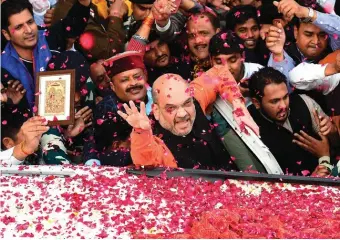  ??  ?? BJP leader Amit Shah arriving at a press conference at party headquarte­rs, New Delhi, December 2017