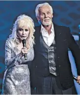  ?? RAHAV SEGEV/WIREIMAGE 2010 ?? Dolly Parton and Kenny Rogers first collaborat­ed in 1983, on “Islands in the Stream,” which rose to No. 1.