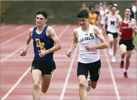  ?? PETE BANNAN — MEDIANEWS GROUP ?? Downingtow­n East’s Brendan Flynn ran a personal best 9:12.11 to take third in the 3200 meter race at the Henderson Invitation­al Friday LaSalle’s Drew Brill was .03faster for second place.