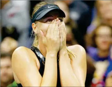  ?? ASSOCIATED PRESS ?? MARIA SHARAPOVA REACTS AFTER DEFEATING second seed Simona Halep of Romania 6-4, 4-6, 6-3 in their opening round match Monday in the U.S. Open tennis tournament in New York.