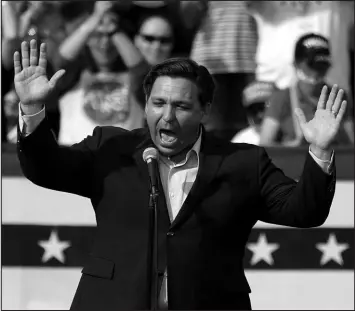  ?? JOHN RAOUX / ASSOCIATED PRESS FILE (2020) ?? Florida Gov. Ron Desantis speaks Oct. 23, 2020, at a campaign rally for then-president Donald Trump in The Villages, Fla.