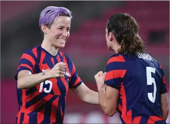  ?? Tribune News Service/getty Images ?? U.S. forward Megan Rapinoe (left) celebrates with teammate defender Kelley O’hara after winning the Tokyo 2020 Olympic Games women’s bronze medal football match between Australia and the United States at Ibaraki Kashima Stadium in Kashima city, Ibaraki prefecture, on Aug. 5, 2021.