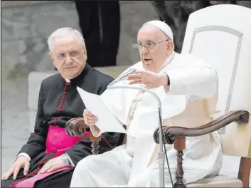  ?? Alessandra Tarantino
The Associated Press ?? Pope Francis delivers his speech on Saturday during an audience with pilgrims from Rho diocese in the Paul VI Audience Hall at the Vatican.