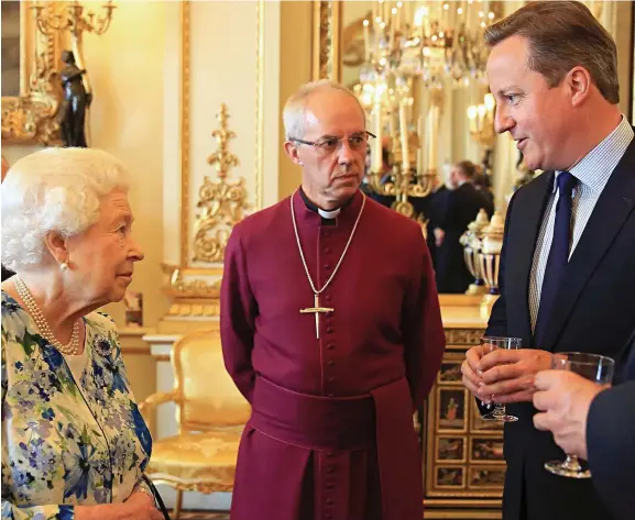  ??  ?? Candid conversati­on: David Cameron with the Queen and Archbishop of Canterbury Justin Welby at yesterday’s event for her 90th birthday