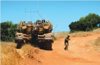  ?? (Basel Awidat/Flash90) ?? SOLDIERS PATROL along the border with Lebanon yesterday.