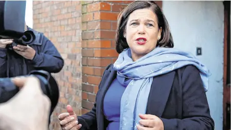  ?? PHOTO: REUTERS ?? Pot of gold:
Mary Lou McDonald is among those guilty of promising the world to voters, but not saying where the money will come from.