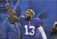  ?? SETH WENIG — ASSOCIATED PRESS ?? Odell Beckham reacts after throwing a touchdown pass against the Bears on Dec. 2, 2018, in East Rutherford, N.J.