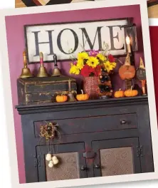  ??  ?? Ellie and Bob left the original beams exposed in the kitchen and hung a collection of baskets from their flathead nails. A painted floorcloth ties together the room’s various elements. A reproducti­on pie safe makes a wonderful gathering place for fresh flowers, pumpkins and other autumn decor. Old school bells—Ellie began collecting them after moving into her home as a nod to its schoolhous­e past—sit atop an antique lap desk.